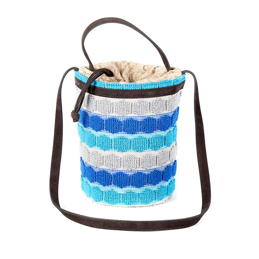 blue cotton woven bucket bag with brown suede crossbody strap