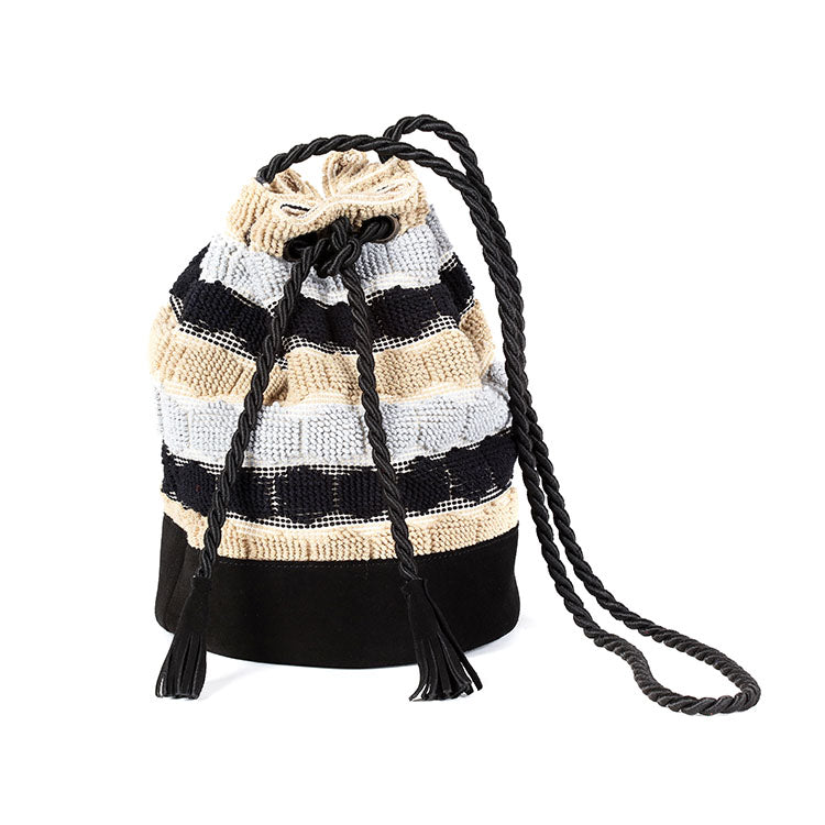 beige and black cotton woven bucket bag with black tassels